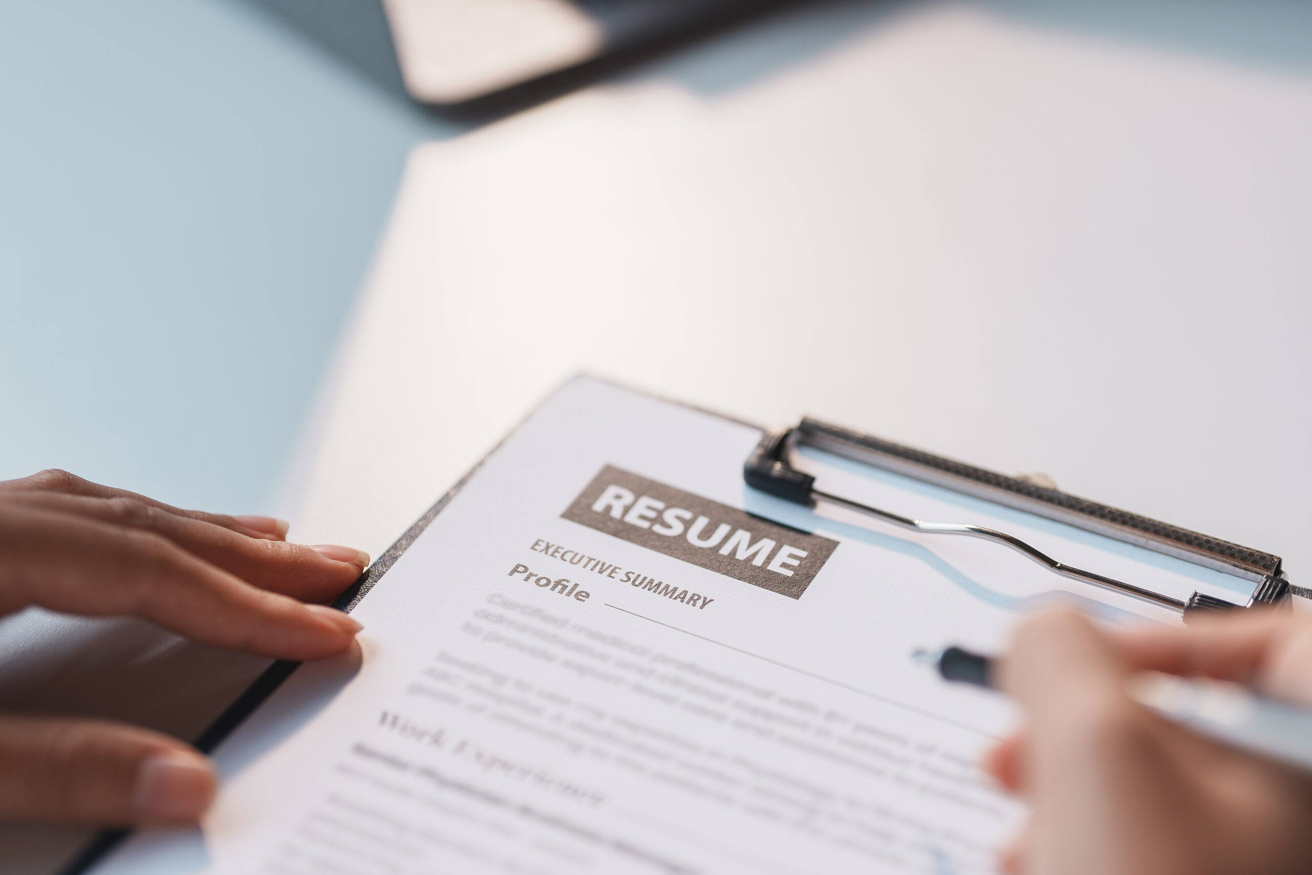 New graduates fill out a job application form history details